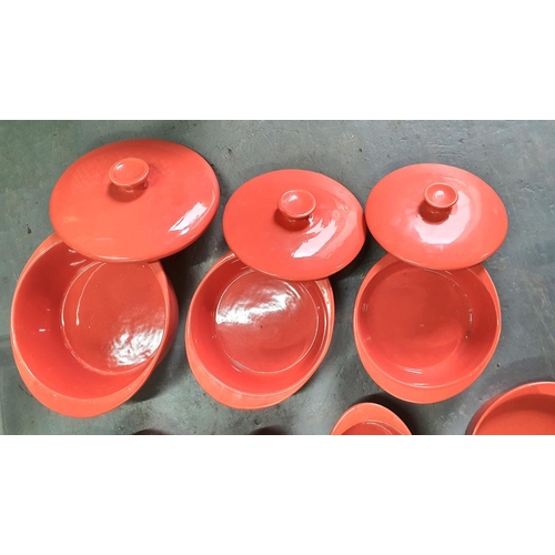 385 - Three ceramic red lidded tureens together with associated serving dishes etc (Qty)