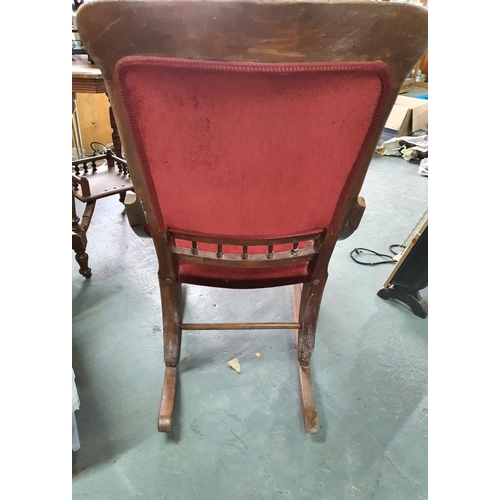 422 - Antique rocking chair with red upholstered seat and back