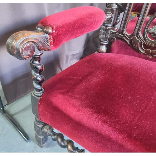 429 - Two Edwardian throne chairs, upholstered in red fabric with ornate carving and barley twist (2)