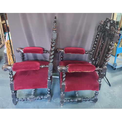 429 - Two Edwardian throne chairs, upholstered in red fabric with ornate carving and barley twist (2)