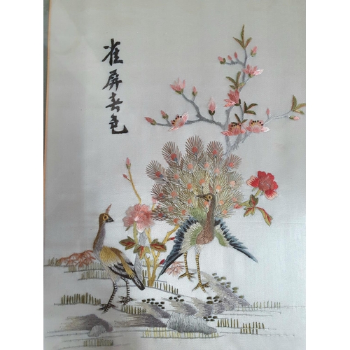 347 - Two framed Oriental silk-work panels depicting birds in foliage (2)