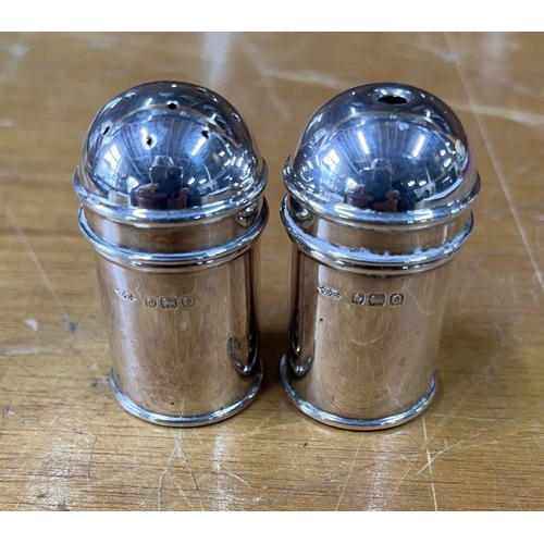 7 - Pair of Edwardian Birmingham silver salt and pepper pots in traditional form