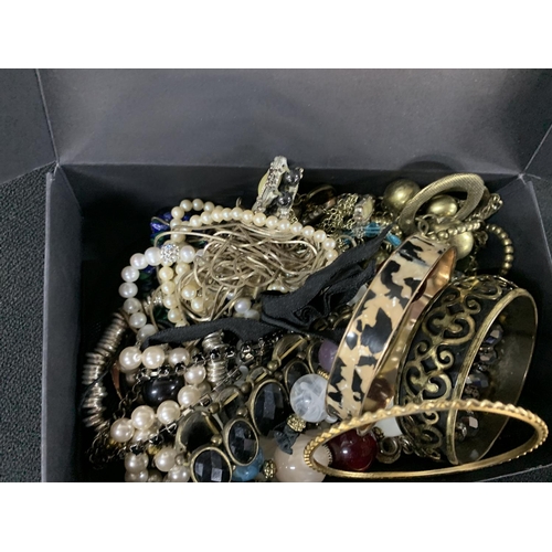 42 - Costume jewellery in black box