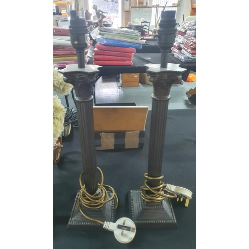 57 - A Pair of ornate Brass Corinthian table lamps (2)