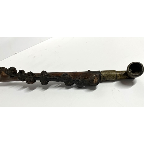 20 - Wooden carved antique Chinese Opium pipe

Approx 52cm long