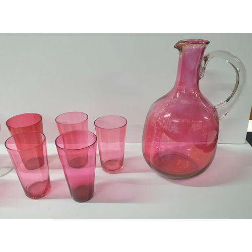 54 - Victorian cranberry jug with 6 associated wine glasses and 5 tumblers (12)