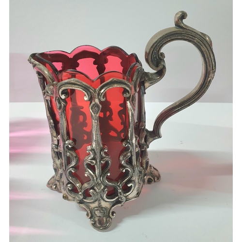 55 - Victorian cranberry tankard with pewter collar & handle together with a cranberry over-laid jug and ... 