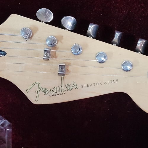 91 - Fender Stratocaster-style in Olympic white bearing serial No. Z200804 with hard case and accessories