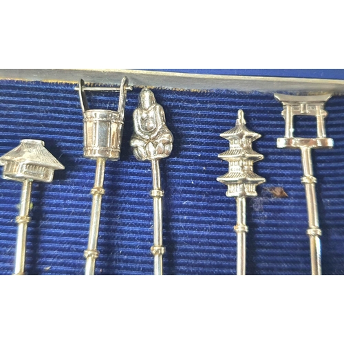 9 - set of 6 silver spoons in the form of bamboo sticks with different Chinese charms to each end (6),

... 