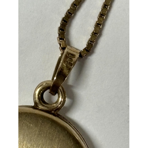 12 - 9ct yellow gold chain and large oval locket,

9.6 grams