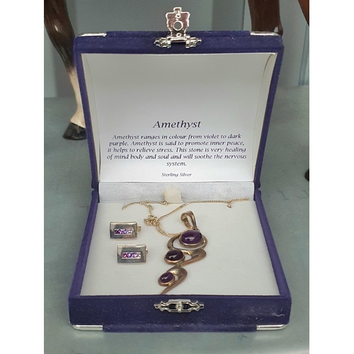 18 - Sterling silver and Amethyst necklace an earring set in presentation box