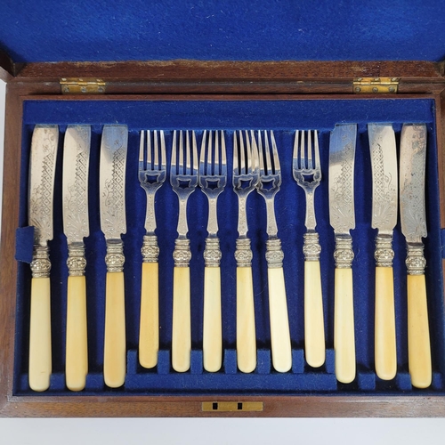 57 - Two cased sets of silver plated cutlery, 5 of the knives may have silver handles but the marks have ... 