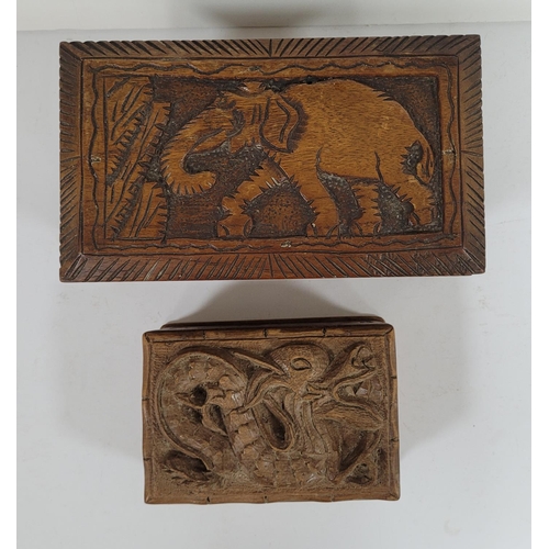 66 - Two small carved 20thC wooden boxes (2)