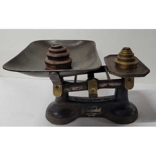 91 - Set of antique shop weighing scales along with two sets of weights