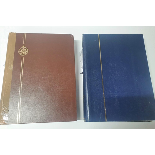 209 - Two stamp albums (Brown & blue) containing hundreds of Czech stamps, mint and used sets and mini-she... 