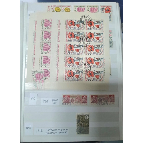 209 - Two stamp albums (Brown & blue) containing hundreds of Czech stamps, mint and used sets and mini-she... 