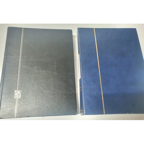 210 - Two stamp albums (Black & blue) containing hundreds of Czech stamps, mint and used sets and mini-she... 