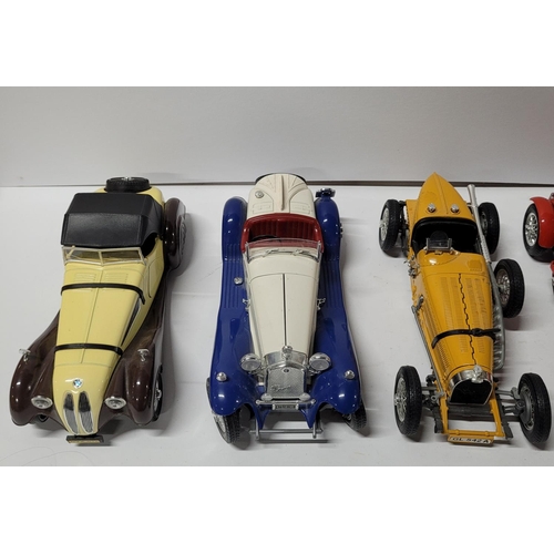 227 - Five different over-sized diecast model cars by Burago (5)