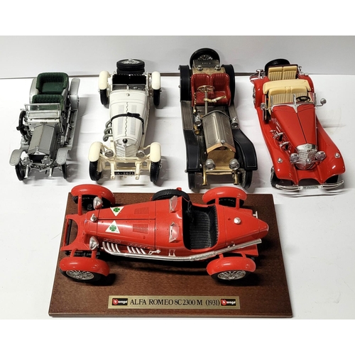 228 - Five different over-sized diecast model cars by Burago including one on a wood plinth (5)