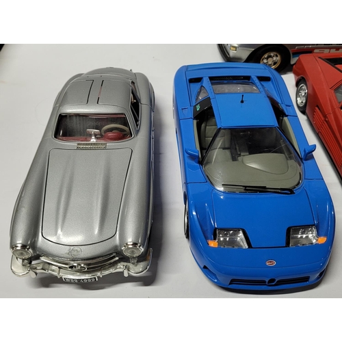 229 - Collection of six 1980's to 1990's die cast sports cars by Burago (6)