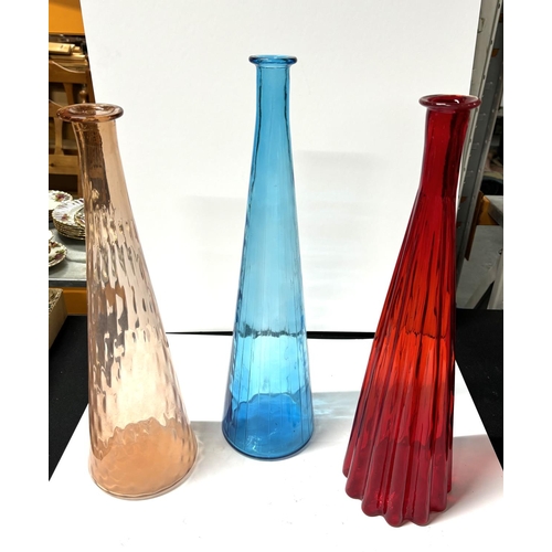 422 - Three various tall, coloured glass floor vases (3)