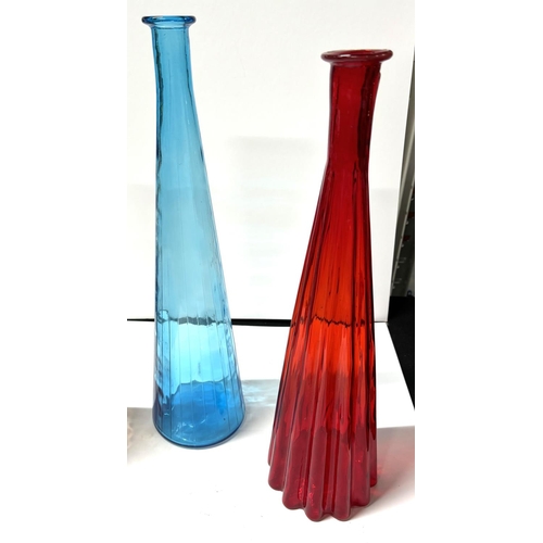 422 - Three various tall, coloured glass floor vases (3)