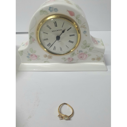 428 - Wedgewood mantle clock together with 2 Wedgewood beatrix Potter bowls (1 chipped) and a costume jewe... 