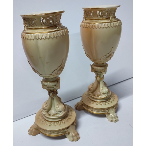 429 - Pair of Royal Worcester, 1639, porcelain blush ivory vases, one is slightly a/f,

22.5cm high each