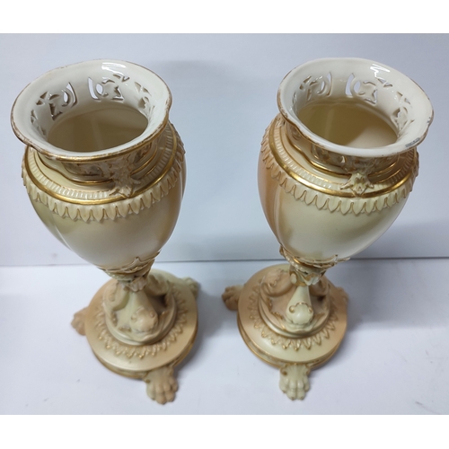 429 - Pair of Royal Worcester, 1639, porcelain blush ivory vases, one is slightly a/f,

22.5cm high each