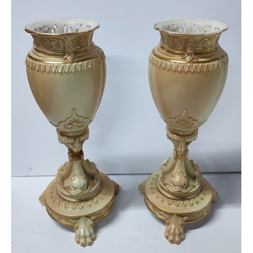 429 - Pair of Royal Worcester, 1639, porcelain blush ivory vases, one is slightly a/f,

22.5cm high each