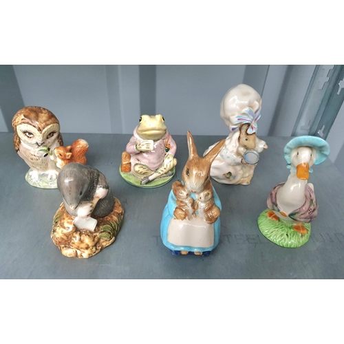 409 - Nine Beatrix figurines, mainly Beswick together with a Beatrix Potter bowl (10)