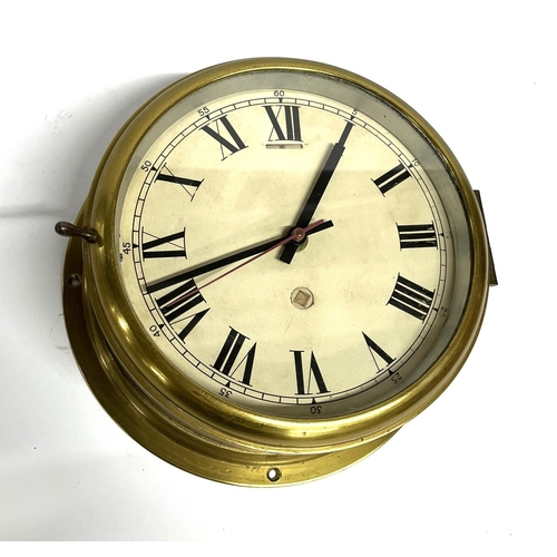 226 - Ships brass cased wall clock with Roman numerals