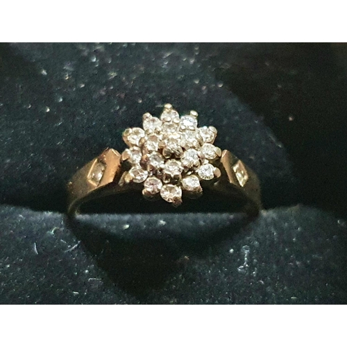 32 - 9ct yellow gold diamond cluster ring in presentation box,


2.1 grams gross         size K