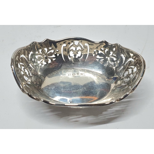 19 - Fine quality Birmingham 1918 pierced bon bon dish on four feet

35 grams