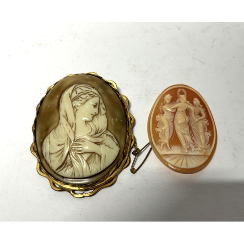 39 - Large Victorian cameo in pinchbeck mount together with another large unframed Victorian cameo (2)