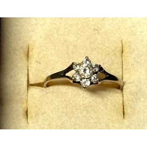 58 - 9ct yellow gold, floral Cz ring