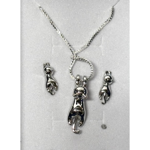 63 - Two silver chains with matching earrings