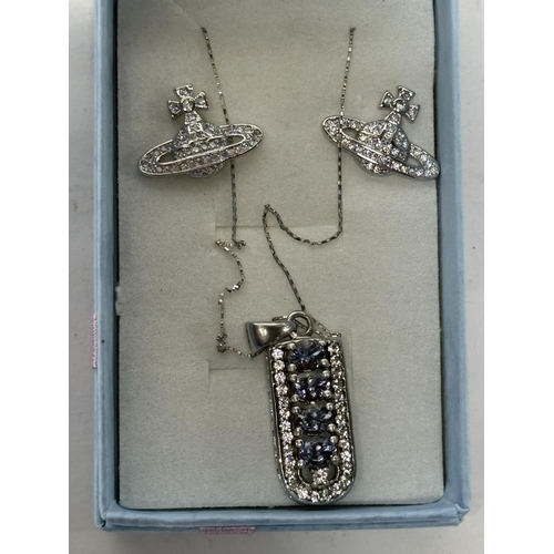 64 - Silver chain with associated earrings