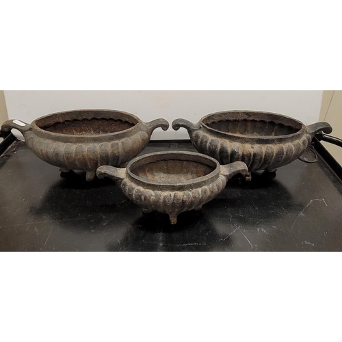 70 - Three small old cast-iron planters, various sized (3)