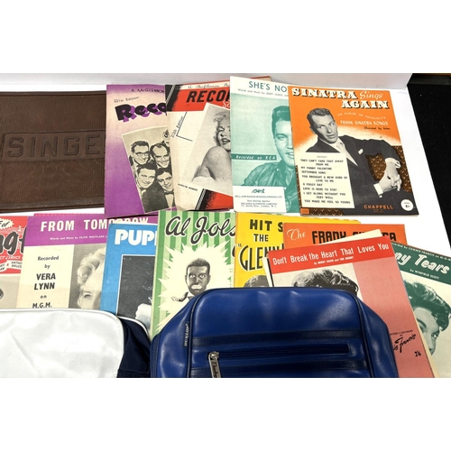 136 - Singer mat with 2 bags and music magazines including Elvis (Qty)