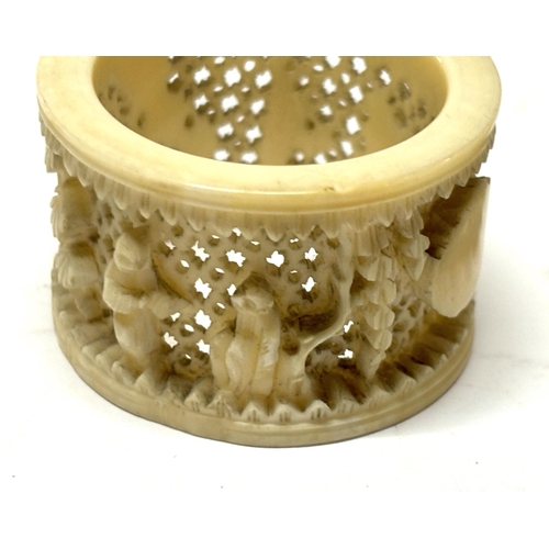 154 - Carved Bone napkin ring with bracelet