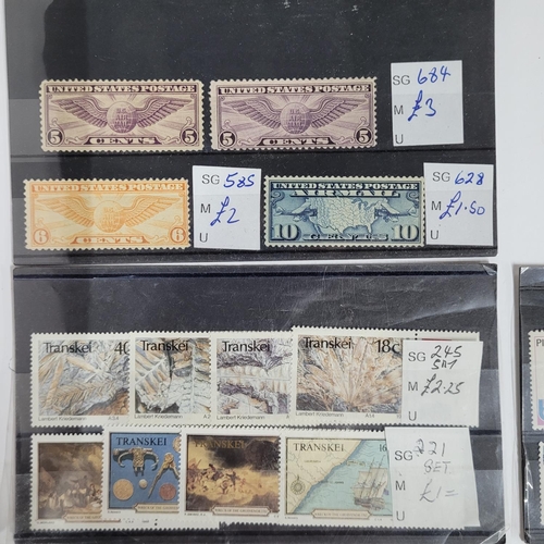 243 - Large qty of M/UM  and used, UNEXAMINED world stamps including Spain, Luxembourg, Poland, USA etc (Q... 