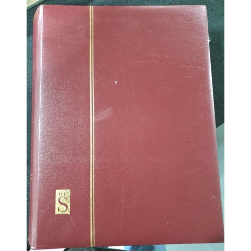 255 - Red WHS stamp stock book containing a large quantity of world stamps, mainly used unmounted, both 19... 