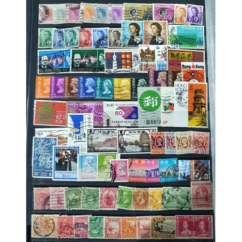 255 - Red WHS stamp stock book containing a large quantity of world stamps, mainly used unmounted, both 19... 