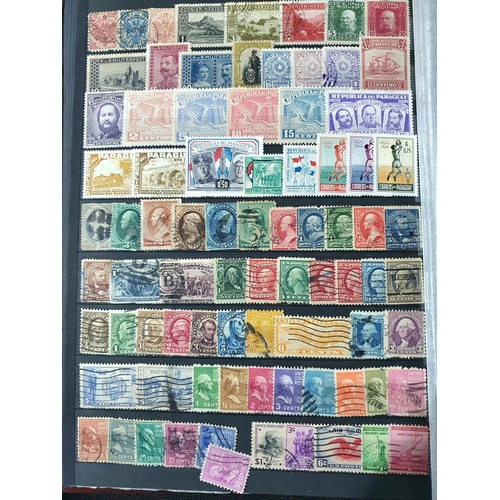 255 - Red WHS stamp stock book containing a large quantity of world stamps, mainly used unmounted, both 19... 