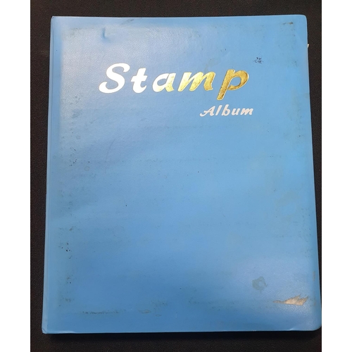 272 - Blue stamp album containing a large collection of mint and used world 20thC stamps (Qty)