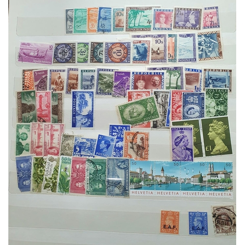 272 - Blue stamp album containing a large collection of mint and used world 20thC stamps (Qty)