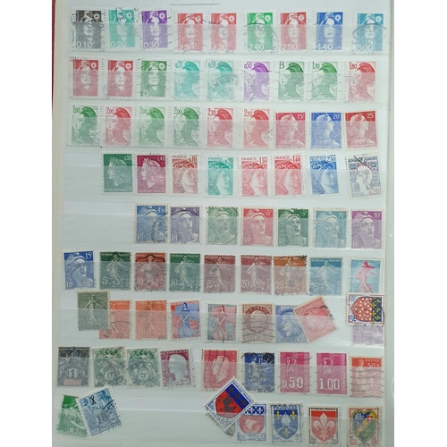 273 - Red Postzegels stamp album containing a large collection of mint and used world 20thC stamps (Qty)