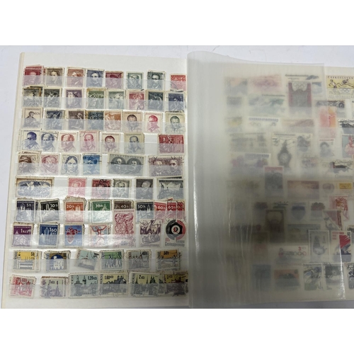 278 - Blue stamp book including a large quantity of 20th world stamps, mainly used unmounted (Hundreds)