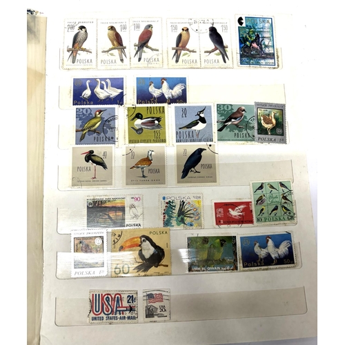 279 - Blue Stamp Album containing world stamps, mainly used unmounted including a large quantity of bird r... 